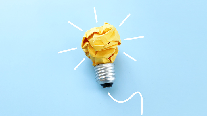 Illustrazione di una lampadina metafora del trovare un'idea geniale. 