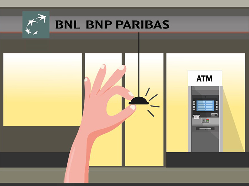Una mano illustrata spegne la luce delle insegne mentre la luce dell'area ATM resta accesa per poter operare in sicurezza. 